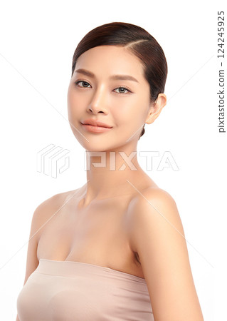 A beautiful young Asian woman with clean, fresh skin against a white background. Skincare, facial treatment, cosmetology, beauty, and spa. An elegant portrait of an Asian woman. A beautiful young Asian woman with clean, fresh skin against a white background. Skincare, facial treatment, cosmetology, beauty, and spa. An elegant portrait of an Asian woman. 124245925