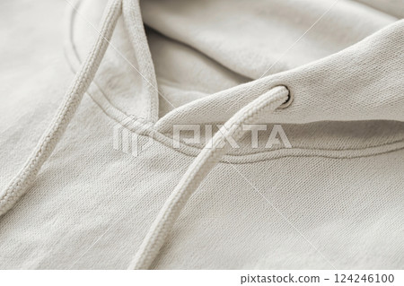 Neutral Hoodie Close-Up for E-Commerce Display Highlighting Drawstrings and Fabric Texture 124246100