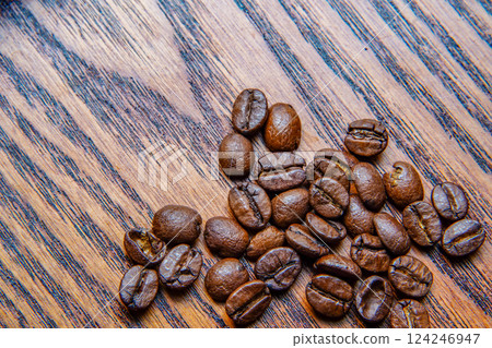 A close-up of coffee beans conveying the atmosphere of a home cafe 124246947