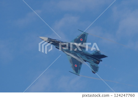 The Japan Air Self-Defense Force's Flight Development and Test Wing's F-2B performs a maneuvering flight at an air show 124247760