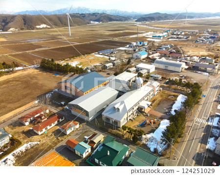 Aerial view of Esashi Town's Esashi Kita Elementary and Junior High School in early spring in Esashi Town, Hokkaido Aerial view of Esashi Town's Esashi Kita Elementary and Junior High School in early spring in Esashi Town, Hokkaido 124251029