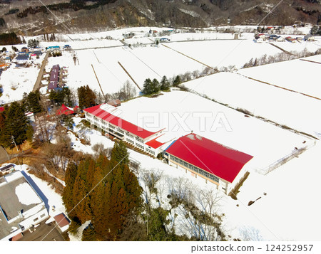 Aerial view of the closed Uzura Junior High School in Atsuta-cho, Hokkaido in early spring Aerial view of the closed Uzura Junior High School in Atsuta-cho, Hokkaido in early spring 124252957