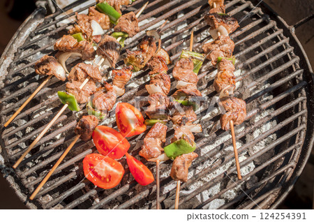 Top view of delicious grilled meat skewers. grilled homemade roast beef skewers 124254391