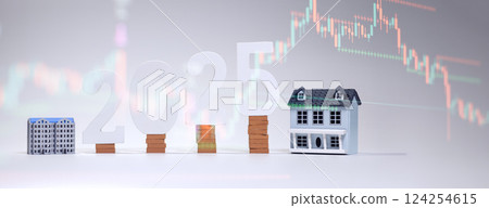 2025 real estate market forecast with house models and brick stacked 124254615