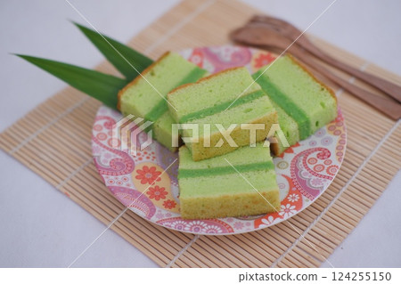 several slices of green pandan sponge cake 124255150