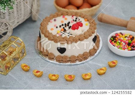 decorated round cake with white and light brown frosting decorated round cake with white and light brown frosting 124255582