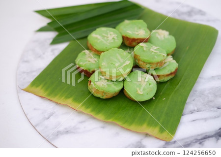 Pandan flavored cake with beautiful green leaves Pandan flavored cake with beautiful green leaves 124256650