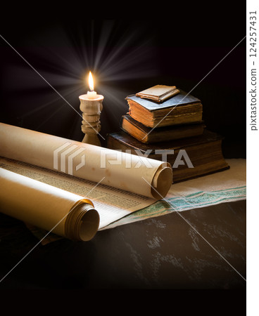Still life from ancient books with candles 124257431