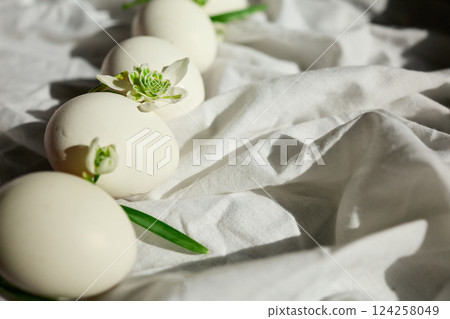 Eggs arranged with delicate flowers Eggs arranged with delicate flowers 124258049