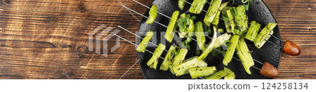 Vegetable celery skewers arrayed on a platter. Vegetable celery skewers arrayed on a platter. 124258134