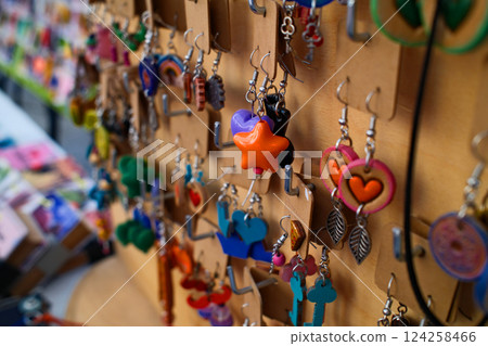 Colorful Handmade Earrings on Display 124258466
