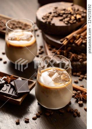 Cream and coffee cocktail in glasses with ice. 124258592