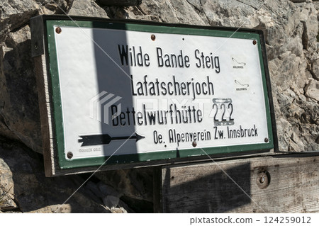 Signs at Wilde Bande Steig at Karwendel mountains on Karwendel Hohenweg, Austria 124259012