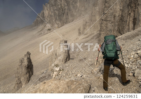 Mountaineer at Eppzirler Scharte, Karwendel mountains, Solsteinhaus hut on Karwendel Hohenweg, Austria 124259631