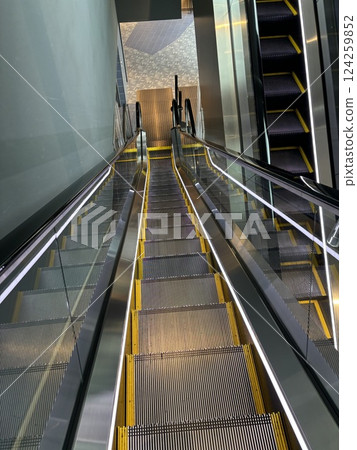 Ride a simple escalator Ride a simple escalator 124259852