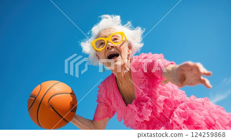 An elderly woman with white hair, wearing yellow glasses and a pink frilly dress 124259868