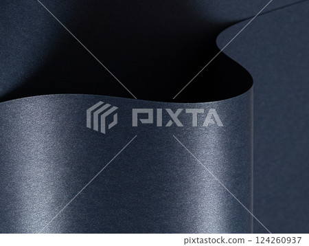 Blue paper background with a smooth, glossy texture and metallic shimmer. Cool, dark tones create an Blue paper background with a smooth, glossy texture and metallic shimmer. Cool, dark tones create an 124260937