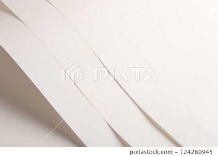 White and beige vellum paper background with a creamy, thin texture. Warm off-white tones create an White and beige vellum paper background with a creamy, thin texture. Warm off-white tones create an 124260945