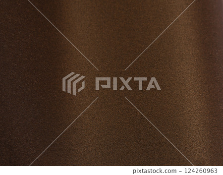 Rich brown paper background with a smooth, grainy texture and a subtle metallic shimmer. Warm gold Rich brown paper background with a smooth, grainy texture and a subtle metallic shimmer. Warm gold 124260963