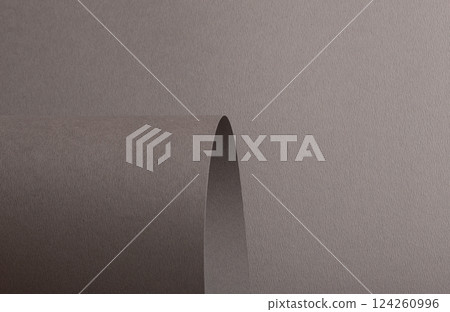 Gray paper background with a matte texture and curved, wavy edges. Neutral taupe and brown tones 124260996