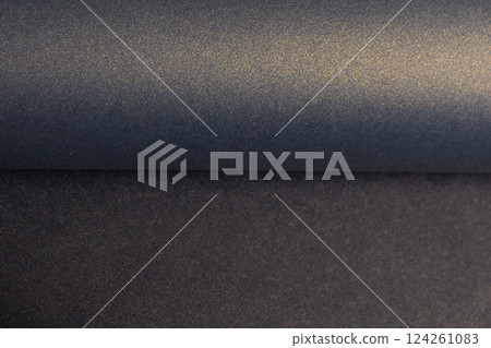 Elegant blue paper texture with a pearlescent shimmer and glossy finish. Rich and reflective surface Elegant blue paper texture with a pearlescent shimmer and glossy finish. Rich and reflective surface 124261083