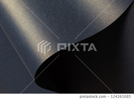 Elegant blue paper texture with a golden shimmer and grainy finish. Rich and glistering designer Elegant blue paper texture with a golden shimmer and grainy finish. Rich and glistering designer 124261085