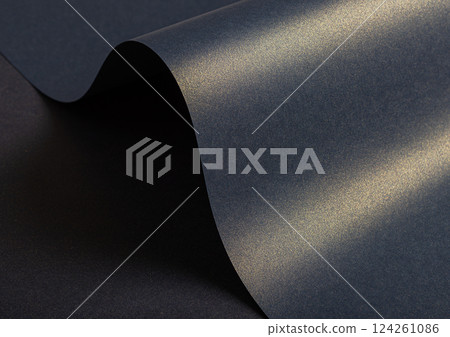 Elegant blue paper texture with a golden pearlescent shimmer and glossy finish. Rich and sleek 124261086