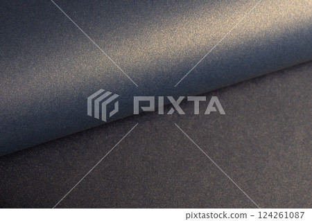 Elegant blue paper texture with a golden pearlescent shimmer and glossy finish. Rich and sleek Elegant blue paper texture with a golden pearlescent shimmer and glossy finish. Rich and sleek 124261087