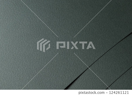 Dark green paper background with a rough, organic texture and perforated details. Deep, natural Dark green paper background with a rough, organic texture and perforated details. Deep, natural 124261121