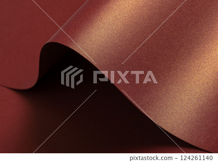 Burgundy paper background with a glossy, pearlescent texture and a shimmering finish. Warm, rich 124261140