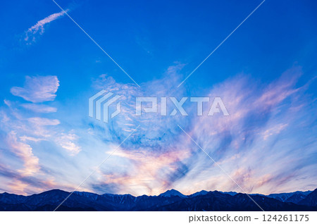 Beautiful evening sky and the Northern Alps Beautiful evening sky and the Northern Alps 124261175