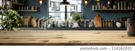 Warm and inviting kitchen interior featuring a wooden countertop and blurred background details. Ideal for culinary or lifestyle themes. 124262035