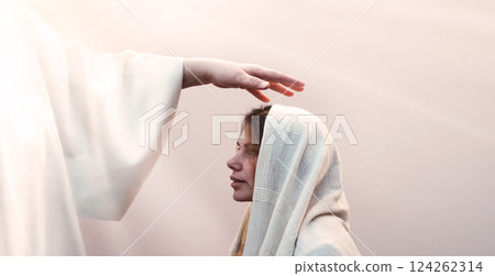 Blessing hand above the head of a woman in a headscarf 124262314