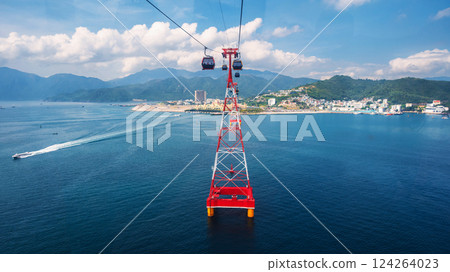 ropeway cable car cabins on cableway over sea to VinWonders Vinpearl Amusement Park in Nha Trang in Vietnam ropeway cable car cabins on cableway over sea to VinWonders Vinpearl Amusement Park in Nha Trang in Vietnam 124264023