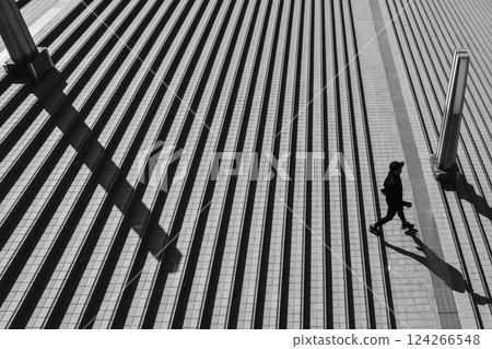 City stairs and shadow of a person 124266548