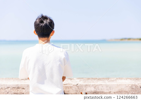 Men watching the sea Men watching the sea 124266663