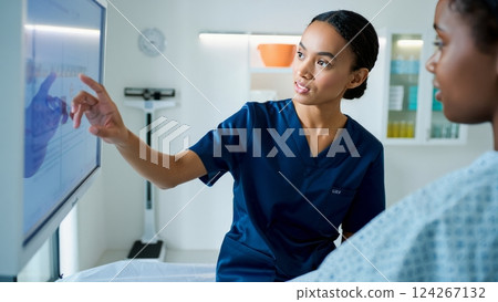 A doctor and patient discussing a wellness plan in a modern, sunlit clinic A doctor and patient discussing a wellness plan in a modern, sunlit clinic 124267132