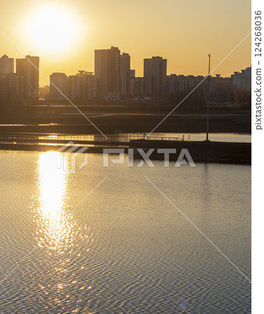 Urban landscape by the sunset Urban landscape by the sunset 124268036