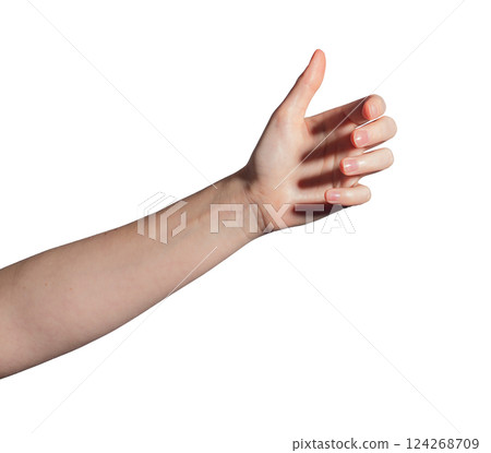 Female hand grasping invisible bottle, gesture symbolizing holding or presenting a product. Natural Female hand grasping invisible bottle, gesture symbolizing holding or presenting a product. Natural 124268709