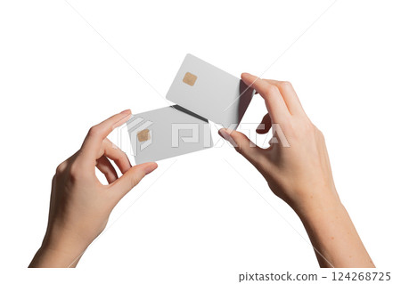 Card in hand, presenting blank plastic credit or debit card. Young female holding two cards with Card in hand, presenting blank plastic credit or debit card. Young female holding two cards with 124268725