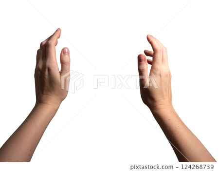 Both hands holding an invisible object, open gesture symbolizing grasping or presenting something. 124268739