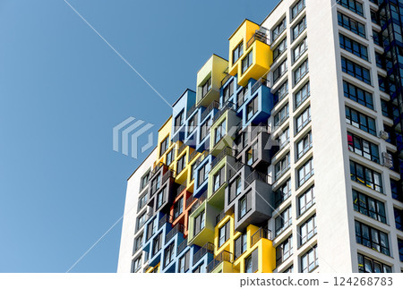 Modern apartment building with large balconies, contemporary architecture, and luxury residential 124268783