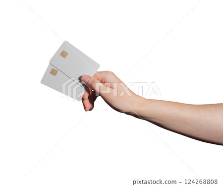 A female hand holding a blank plastic credit card with a chip, promoting cashless payment. Modern A female hand holding a blank plastic credit card with a chip, promoting cashless payment. Modern 124268808