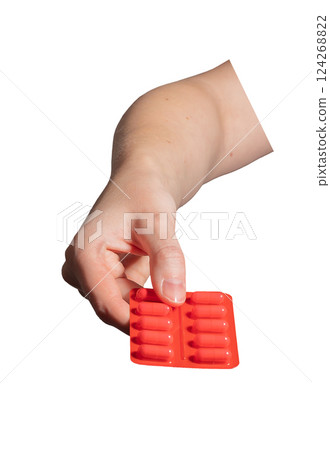 Red pills, pharmaceutical medication for pain relief and treatment. Painkiller, antibiotic, and 124268822