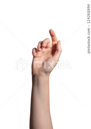 Female hand with slightly curved fingers, index finger extended in a delicate tapping or clicking 124268894