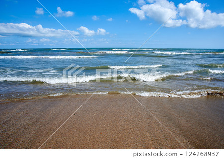 The coast of the Caspian Sea. The beach of the city of Derbent. Republic of Dagestan, Russia 124268937