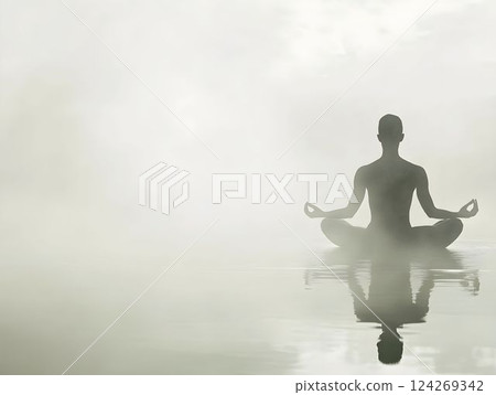 Woman silhouetted practicing lotus pose on water, surrounded by misty atmosphere, embodying meditative tranquility and spiritual connection 124269342