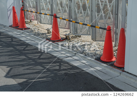 Caster gates to prevent unauthorized entry into construction sites 124269662