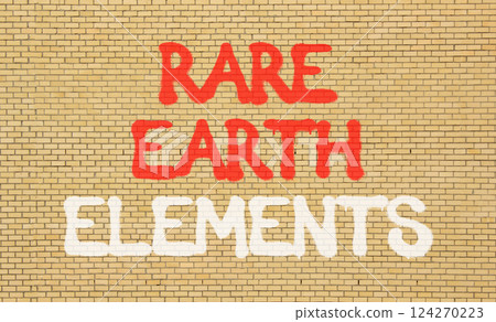 Rare earth elements symbol. Concept words Rare earth elements on beautiful brick wall . Beautiful brick wall background. Business and rare earth elements concept. Copy space. 124270223