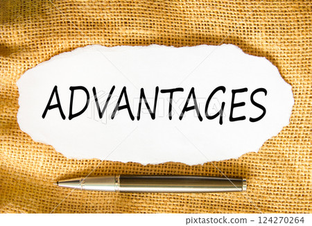Advantages symbol. Concept word Advantages on beautiful white paper. Beautiful canvas background. Beautiful black pen. Business advantages concept. Copy space. 124270264